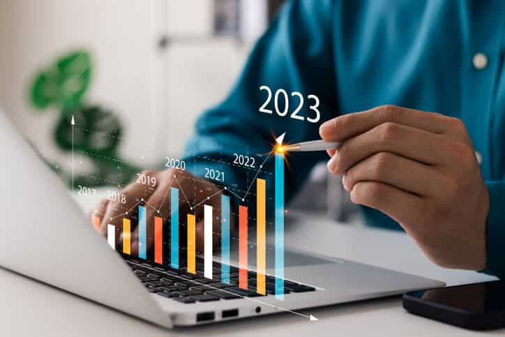 Digital marketing diploma graduate checking analytics chart