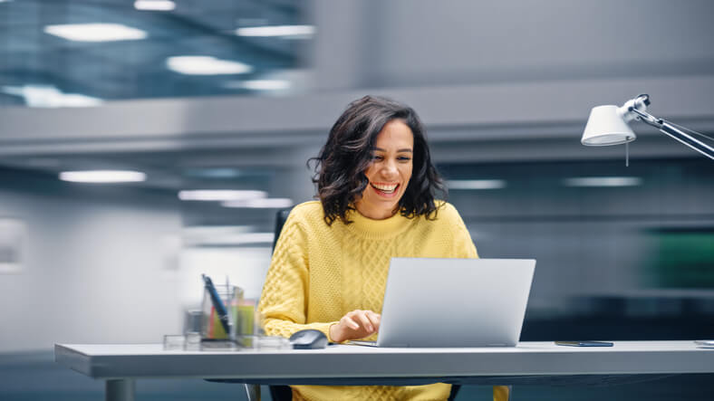 Digital marketing professional working in a modern office after completing her digital marketing course in Vancouver