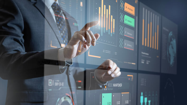 A marketing professional mapping customer journey stages on a screen