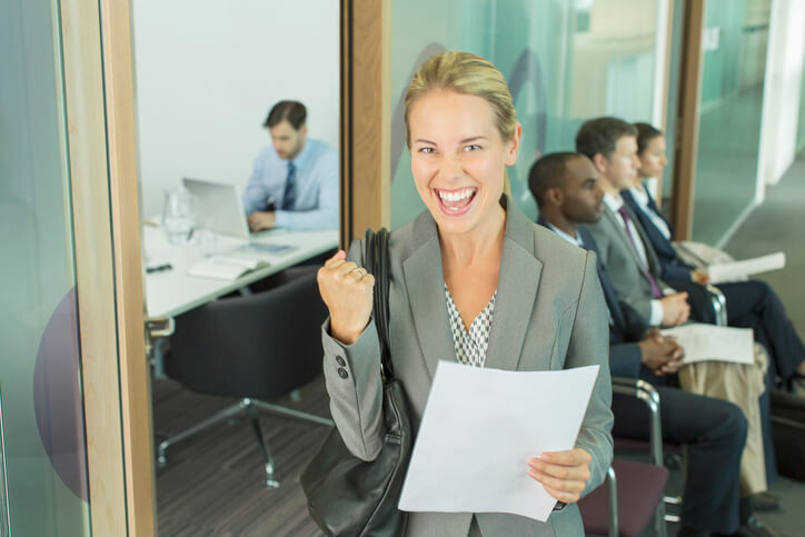 A fresh digital marketing graduate celebrates after landing a digital marketing internship