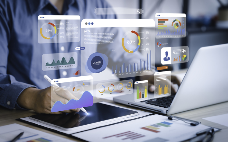 Illustration montrant des graphiques de données et des tableaux de bord de intelligence d’affaires (Business Intelligence) utilisés pour la prise de décision stratégique en entreprise.